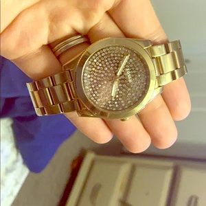 Gold Fossil watch with diamond face
